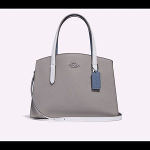 SOLD IN CP - COACH Charlie Carryall 28